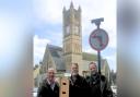 From left, Rev Brian Harley, Bob Lord, Robin Harley in front of Shanklin United Reform Church' s bell tower