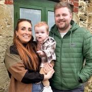 Jess and Dan Ward, with their son Teddy.