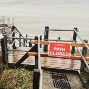 Work begins on the new Needles beach steps and the closed sign in December 2023