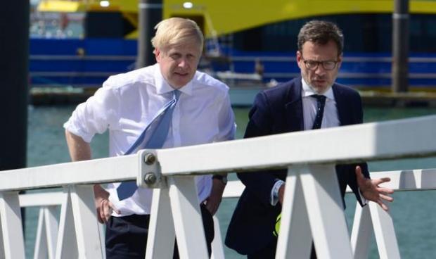Isle of Wight County Press: Boris Johnson with MP Bob Seely during a visit to the Island in 2019.