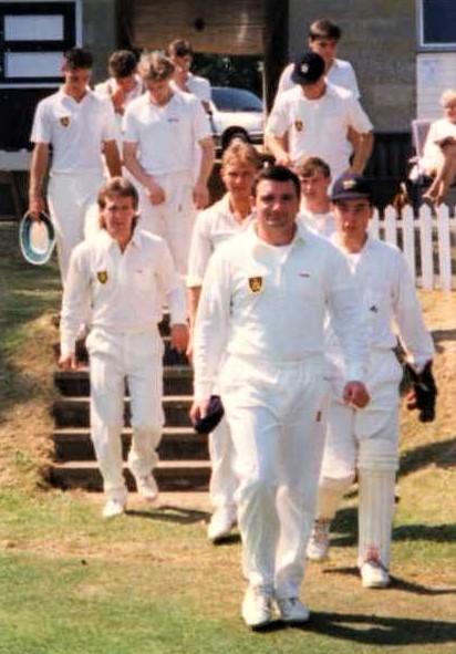 Isle of Wight County Press: Andy leads the Island team out at Shanklin's Westhill ground. 