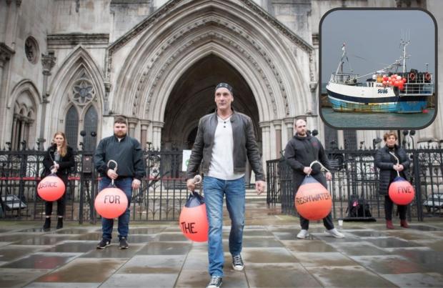 Isle of Wight County Press: Scott Birtwistle (second right) who was sentenced to 14 years' detention and Daniel Payne (centre), who was jailed for 18yrs, two members of the Freshwater Five, for trying to smuggle 250kg of cocaine into the UK, outside the Royal Courts of Justice.