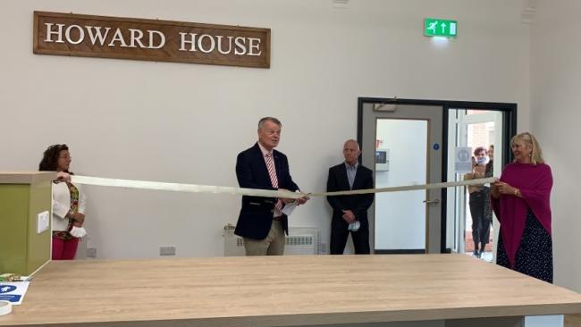 Cllr Karl Love cut's the ribbon at Howard House with Cllr Lora Peacey-Wilcox, Jamie Brenchley and Dr Carol Tozer.