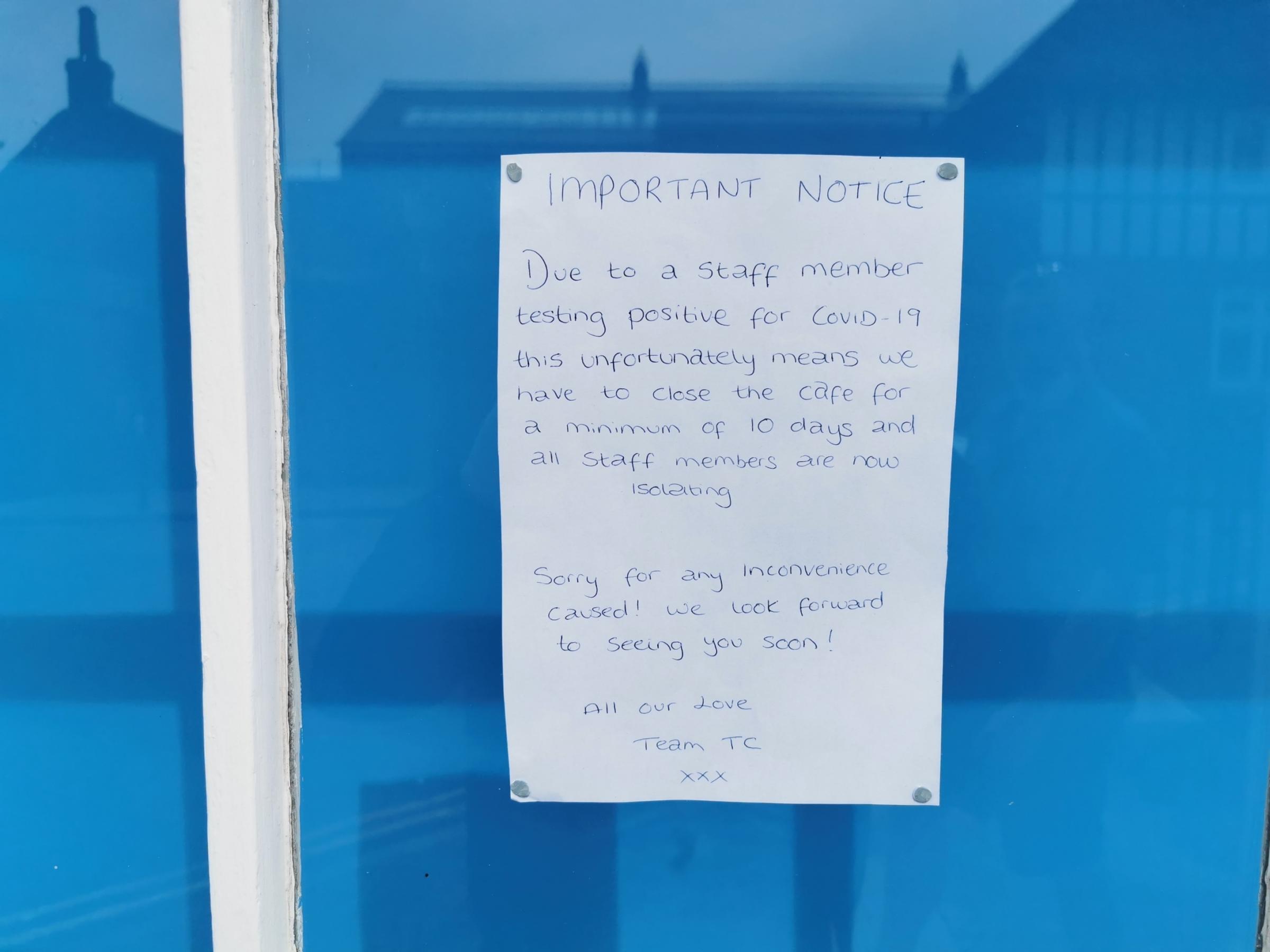 A notice to customers attached to a window at Town Choice cafe, Town Lane.