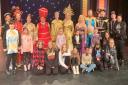 The cast of Aladdin with some of the IW Young Carers.