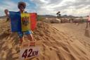 Island runner completes back-to-back Sahara Desert marathons for MAD-Aid