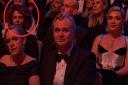 Donna Langley, sat behind Emma Thomas and Christopher Nolan.