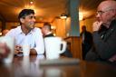 Prime Minister Rishi Sunak meeting veterans at a community breakfast in his constituency in Northallerton, North Yorkshire, while on the General Election campaign trail. Picture date: Saturday May 25, 2024.