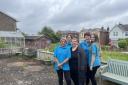 Staff in the garden at Easthill Home for Deaf People in Ryde