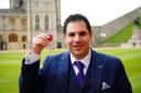 Mr Cohen was made an MBE at Windsor Castle (Ben Birchall/PA)