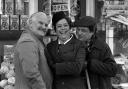 Left to right: Ronnie Barker (A E Arkwright), Lynda Baron (Nurse Gladys) and David Jason (Arkwright's nephew/assisstant Granville) outside the shop during a break in filming Open All Hours in Doncaster (PA)