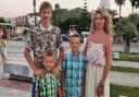 Isle of Wight-based Ukrainian Yuliia withe her three sons.
