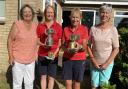 Westridge ladies, Viv Tomlinson and Sally Hardy, with their silverware, joined by Joan Martin and Lynne Maidment.