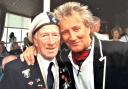 Alec Penstone with Rod Stewart at a past D-Day event in Normandy.
