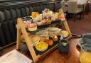 The café has homemade cakes, breakfasts, and lunch options.