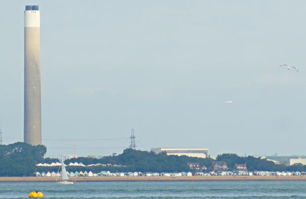 Isle of Wight County Press: Fawley power station's chimney, seen from East Cowes.
