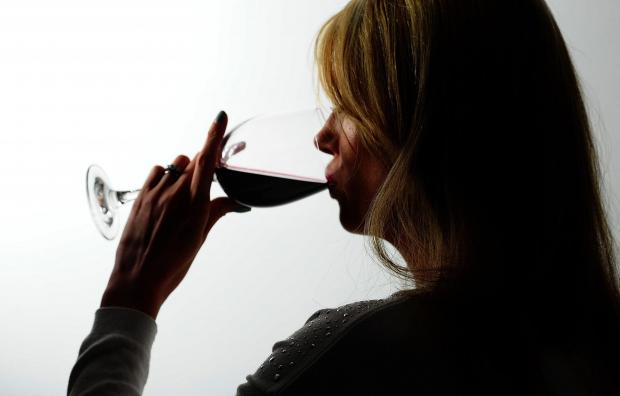 Isle of Wight County Press: A woman drinking red wine. Credit: PA