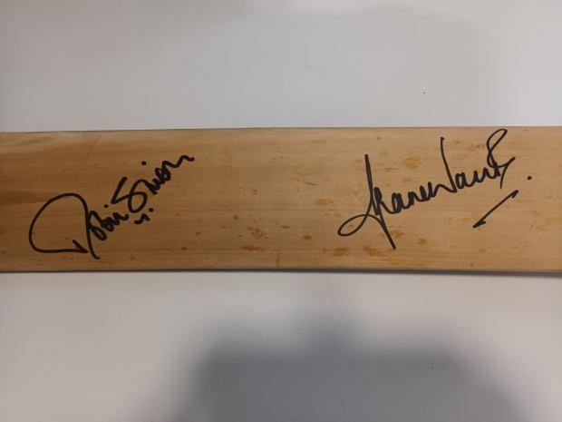Isle of Wight County Press: The bat signed by Robin Smith and Shane Warne.
