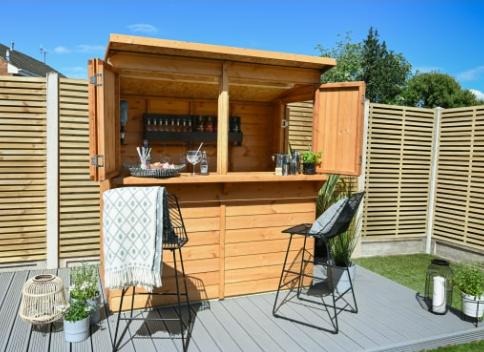 Isle of Wight County Press: Forest Garden 2 x 1.8 x 2m Wooden Garden Bar/Shed with Bi-Fold Shutters. Credit: Wickes