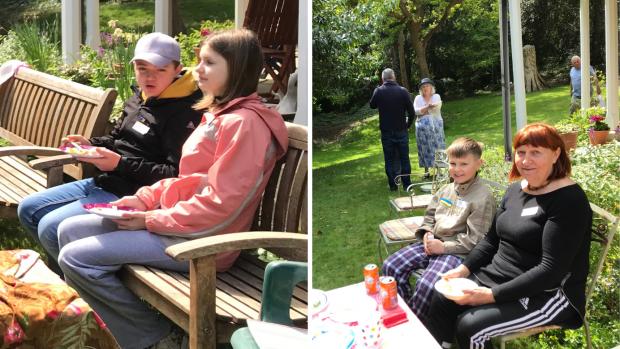 Isle of Wight County Press: Displaced Ukrainians enjoy a garden party at Chris Jarman's.