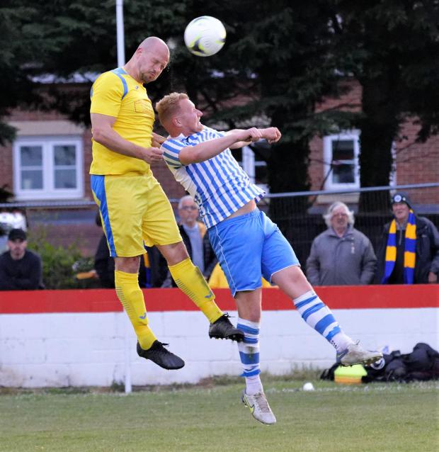 Isle of Wight County Press: Scott Sampson was a colossus at the back for Newport all game. Photo: Barbara Close