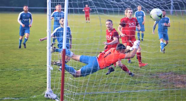 Isle of Wight County Press: Barry Calvert scores the opening goal — finishing off a great save by stand-in keeper Aaron Burford.