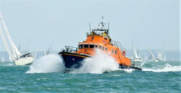 Isle of Wight County Press: The Yarmouth RNLI lifeboat was on patrol in the Western Solent during he race. Photo: RNLI