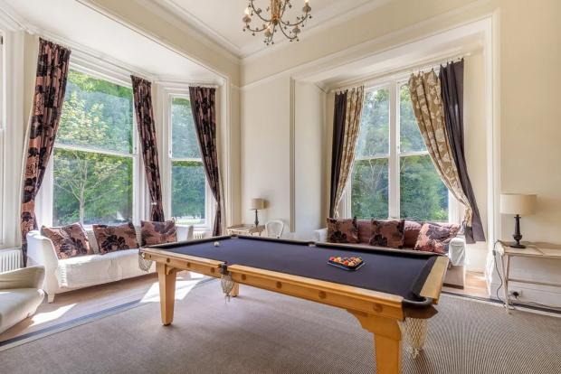Isle of Wight County Press: Views of the grounds can be enjoyed from the sitting room. Picture: Zoopla