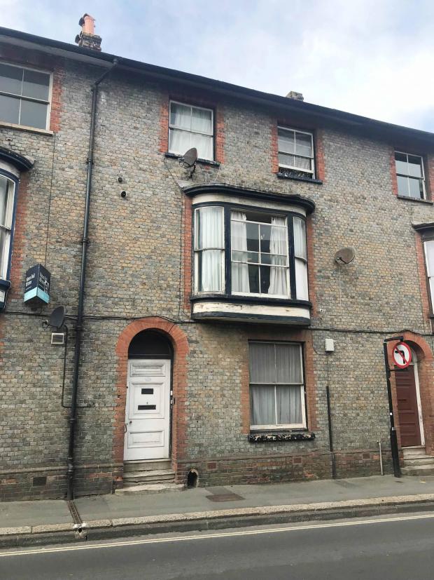 Isle of Wight County Press: The one-bedroom flat in Lower St James Street, Newport.