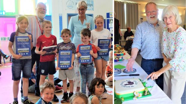 Isle of Wight County Press: Steve Cowley, chairman of WNF, (back left) presents books to children from Shalfleet CE Primary with Lord Lieutenant Susie Sheldon (back right), and Steve cuts the cake at the tea party with Mary Edmunds (right).