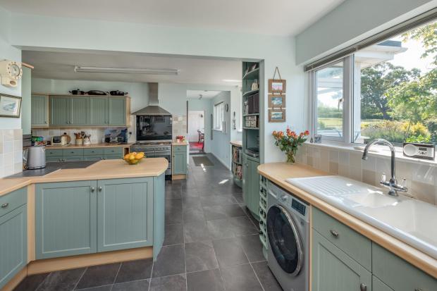Isle of Wight County Press: The kitchen at Bartletts Green Farm Cottage. Photo: Thearle Photography.
