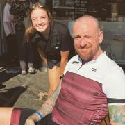 Bradley Wiggins at French Franks in Cowes, with staff member Lottie. Picture courtesy of French Franks.