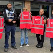 From left, outside Plush Lounge Bar in Basingstoke, displaying the welfare tabards.