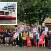 Red Funnel workers striking in East Cowes yesterday.