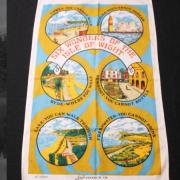 The old Six Wonders of the Isle of Wight, as displayed on this vintage tea towel by Nighs of Shanklin.