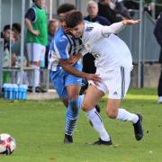 Cowes Sport striker Elias Ahmed taking on a Portland United player at Westwood Park on Saturday.  Photo: Graham Brown