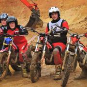 Young trials bike riders at Haslett Sandpit, Shorwell.
