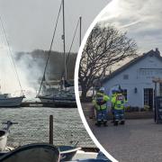 Boat on fire near pub in Whippingham