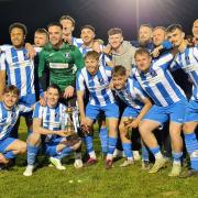 Cowes Sports celebrate winning the 2023 Isle of Wight Senior (Gold) Cup after beating Newport on penalties.