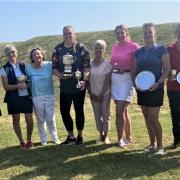 Sammi Keen (centre) flanked by all the other notable successes at the 2023 Isle of Wight Ladies' Golf Championships at Freshwater Bay Golf Club.