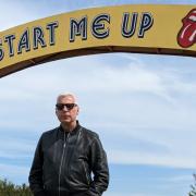 John Giddings under the gateway arch to the Isle of Wight Festival in 2023.