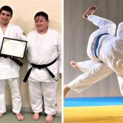 Alex Kujawa, of Freshwater Judo Club, earned his first Dan black belt, centre, flanked by Senseis Martin Holt and Su Webster.