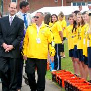 The Duke of Wessex, at The Fairway athletics track in 2011, talking with the late Ray Scovell and former Lord Lieutenant Major General Martin White, with Jorgen Pettersson, then chair of the International Island Games Ass.