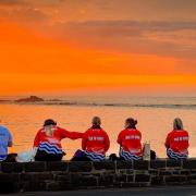 Team Isle of Wight watching the sun set over day one in Guernsey.
