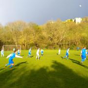 Carisbrooke FC playing on their historic ground.