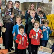 Scouts from Newport watch the moment the time capsule is reburied, with modern-day additions.