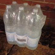 Water bottles left outside homes in Ventnor