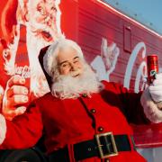 Santa and the Coca-Cola truck.