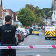 A police officer at the scene in East Cowes.