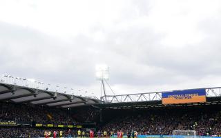 Players applauding in solidarity with Ukraine before the Premier League match at Vicarage Road, Watford (PA)